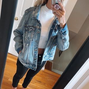 Distressed denim jacket